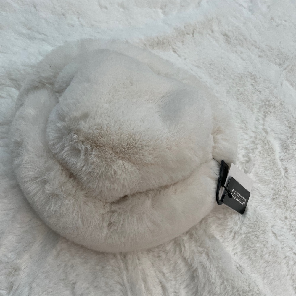 White fur hat